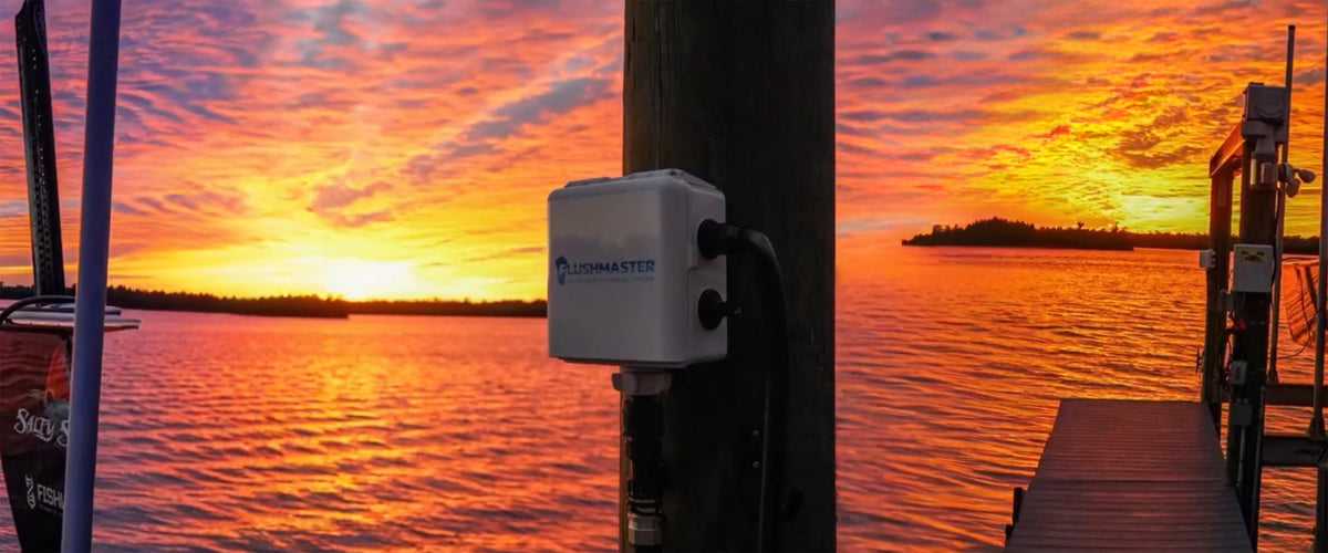 Flushmaster Controller on a dock piling at sunset