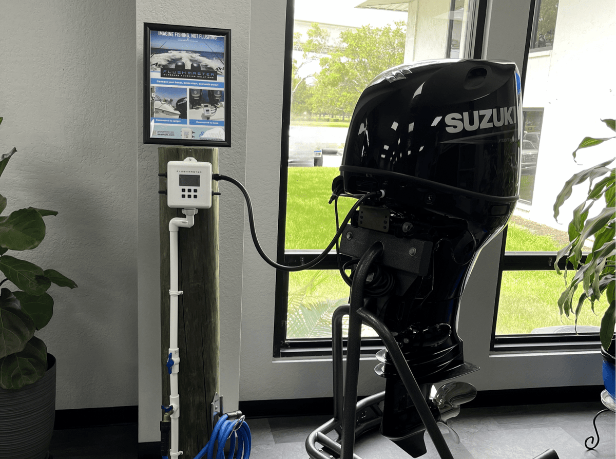 Flushmaster Controller demonstration beside a Suzuki outboard at Mastry Engine Center