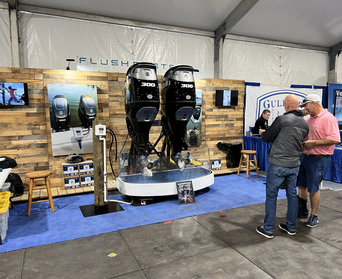 Flushmaster marine trade-show booth with outboard and Controller displays