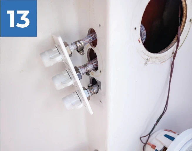 Hoses attached to the pre-installed barbs on the back of the reroute plate.