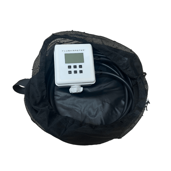 Flushmaster Controller and coiled outlet hoses inside the open Portable Storage Bag