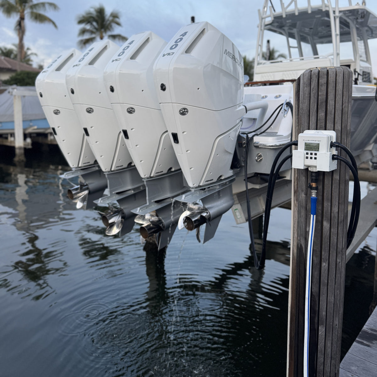 Four Mercury outboards connected to a dock-mounted Flushmaster Controller