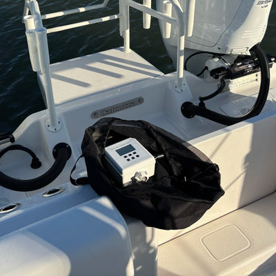 storage bag containing flushmaster controller and hose kits