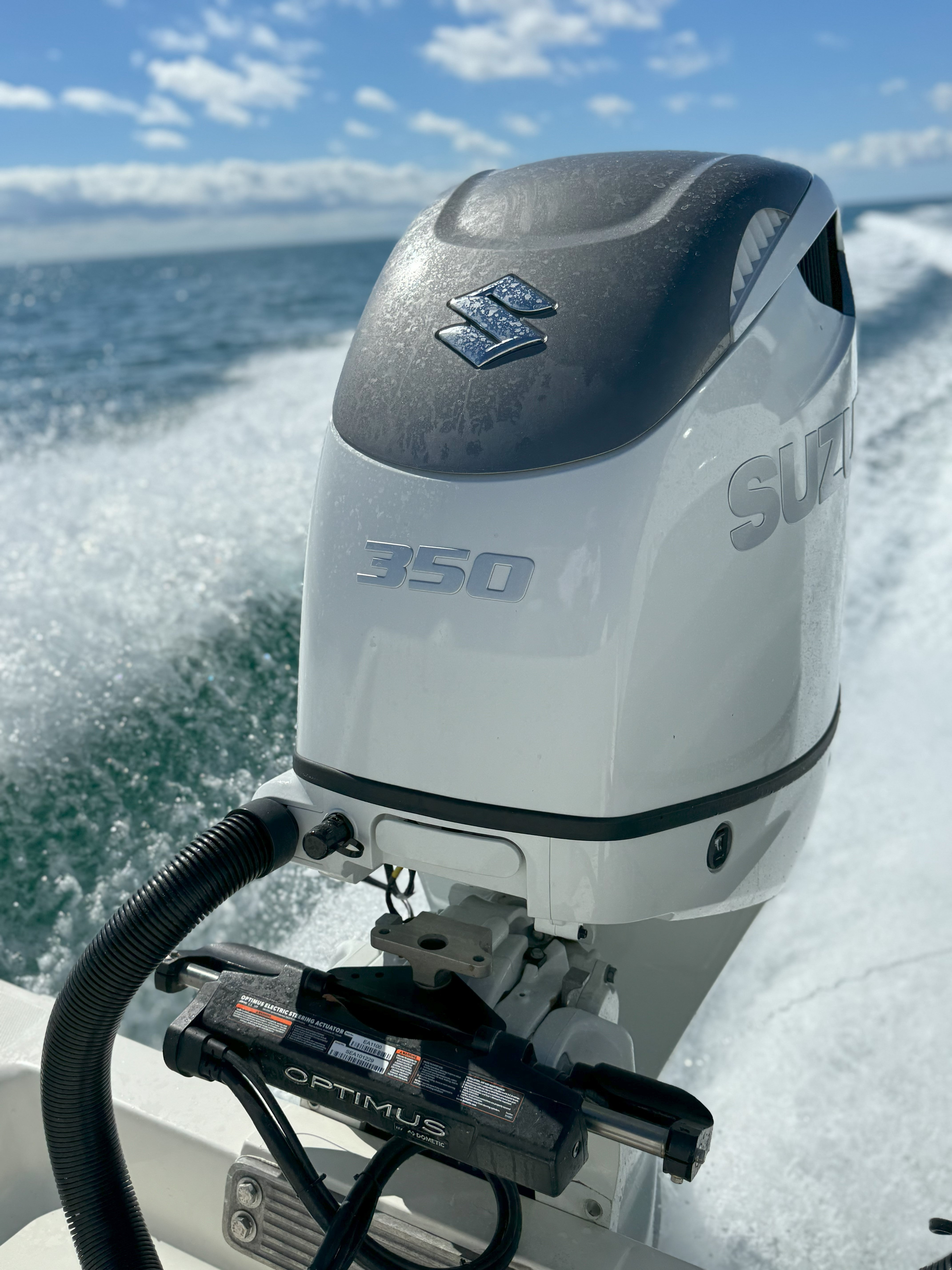 Flush quick connect for Suzuki outboard engines, designed for efficient and secure engine maintenance.