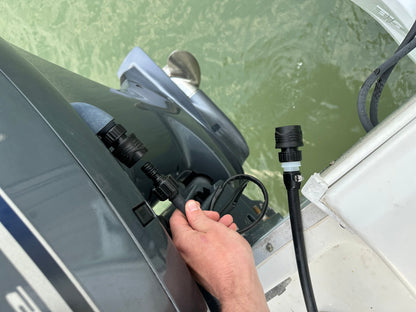 Finished flushing Yamaha outboard engines with quick connect, demonstrating efficient marine engine maintenance.