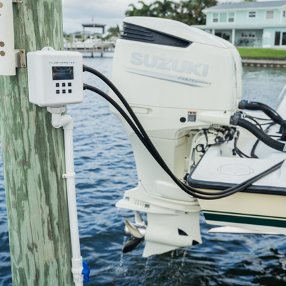 Flushmaster system efficiently flushing dual Suzuki motors, highlighting effective marine engine maintenance.