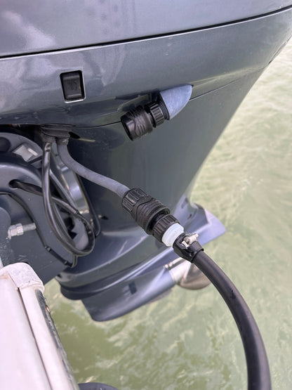 Flushing Yamaha outboard engines with quick connect, ensuring optimal engine performance and maintenance.