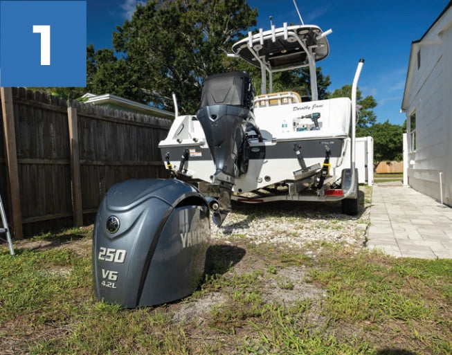 Boat on a trailer with an outboard engine prepared for the Reroute installation example