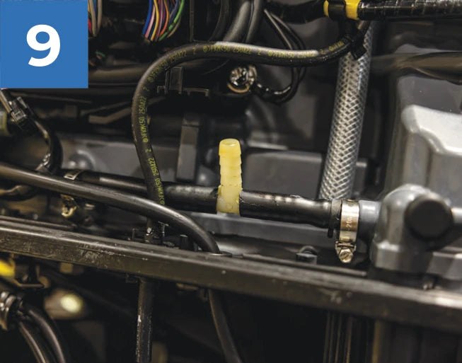 Tee fitting in an engine flush-line example with a hose connection still open