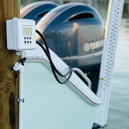 Flushmaster system connected to dual Yamaha outboard engines on a boat, showcasing efficient marine engine flushing and maintenance in saltwater conditions.