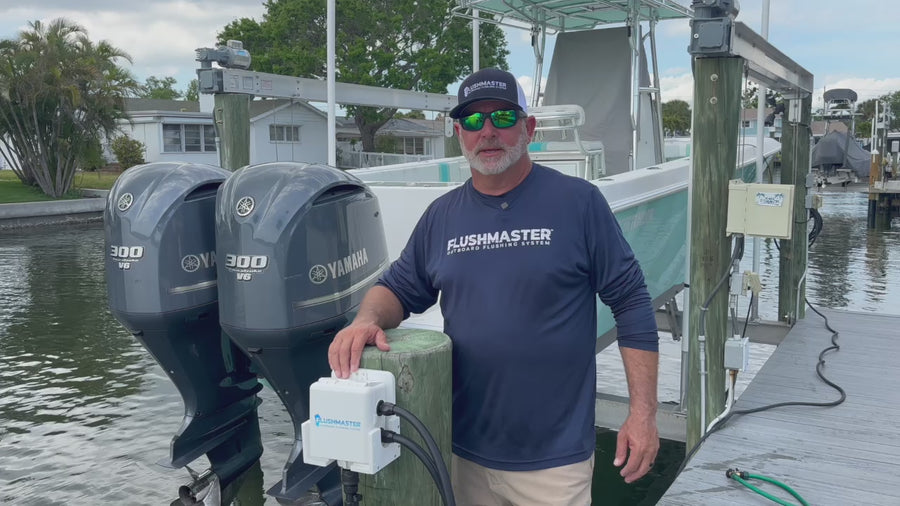 Presenter discussing Yamaha outboard flush connections at the dock